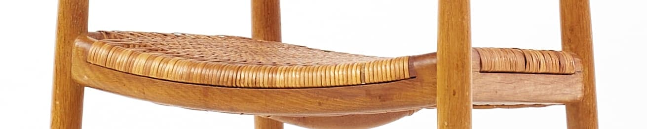 Woven cane seat surface on Hans Wegner The Chair