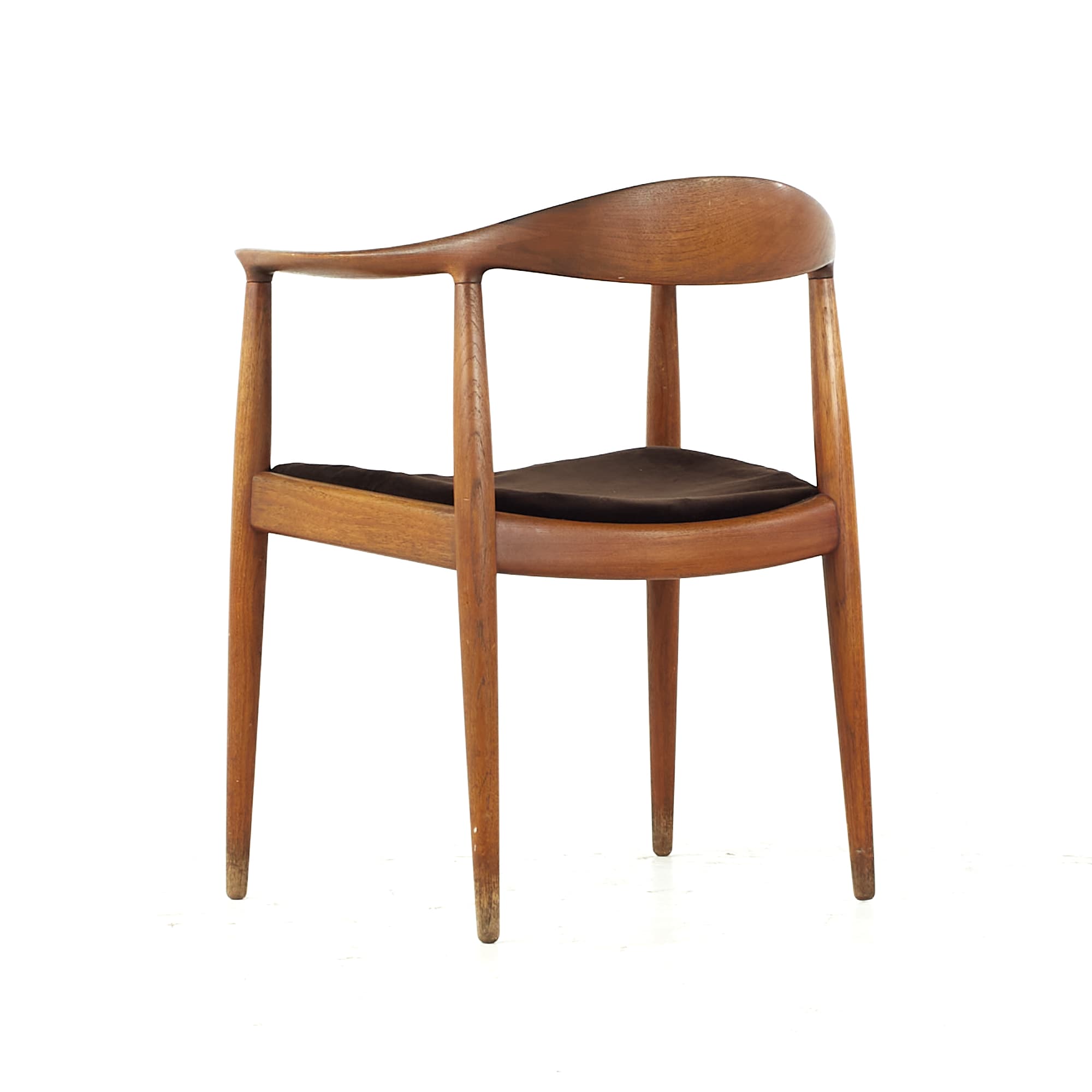Hans Wegner JH-501 "The Chair", front three-quarter view with a black leather seat