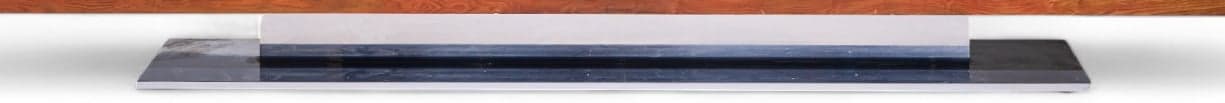Polished metal plinth pedestal base supporting Warren Platner credenza